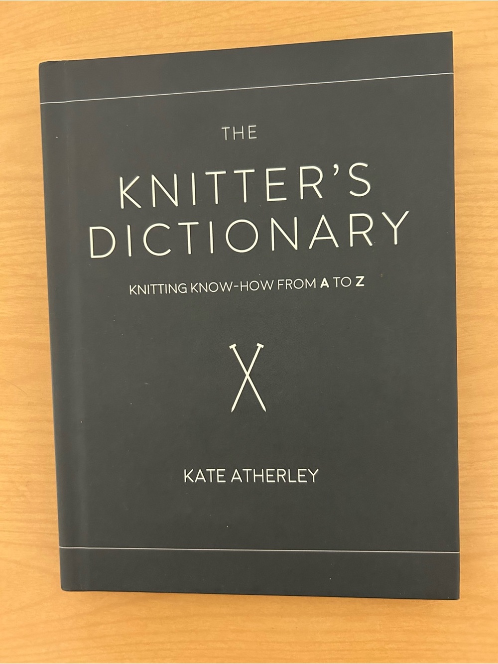 The Knitter's Dictionary - Dark Gray Cover